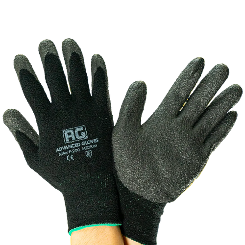 Black gloves with textured palm on a yellow background